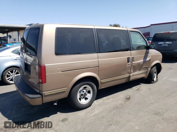 1996 GMC Safari z VIN 1GKDM19W3TB510312, wystawiony jako Copart lot #69528134 z przebiegiem 106 226 mil mil oraz Szkoda całkowita • Salvage title. Historia ofert i sprzedaży dostępna na DreamBid. Obrazek 3.