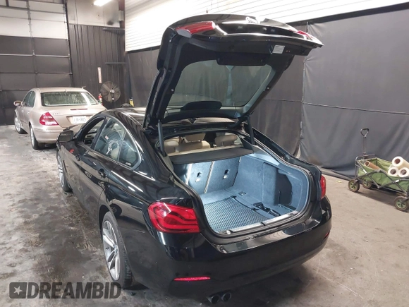 2018 BMW 4 Series 430i xDrive with VIN WBA4J3C56JBL03844, listed as a IAAI auction lot 40864200 with 56,115 mi miles and . Bid and sale history available at DreamBid. Image 3.