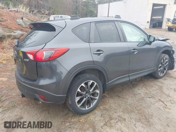 2016 Mazda CX-5 Grand Touring with VIN JM3KE4DY1G0743897, listed as a IAAI auction lot 41935796 with 167,150 mi miles and . Bid and sale history available at carsss.com. Image 4.