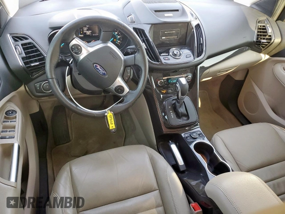 2015 Ford Escape Titanium with VIN 1FMCU0J97FUC88093, listed as a Copart auction lot 60854085 with 64,029 mi miles and Salvage title. Bid and sale history available at DreamBid. Image 8.