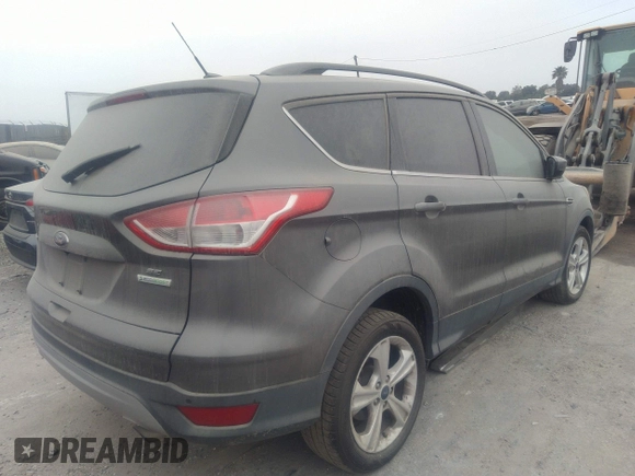 2014 Ford Escape SE with VIN 1FMCU0GXXEUA77765, listed as a IAAI auction lot 40158558 with 88,373 mi miles. Bid and sale history available at carsss.com. Image 4.