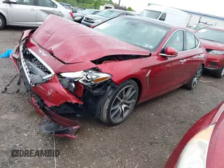 2021 Genesis G70 2.0T with VIN KMTG44LA0MU075456, listed as a IAAI auction lot 42212601 with 19,503 mi miles and . Bid and sale history available at DreamBid. Image 2.