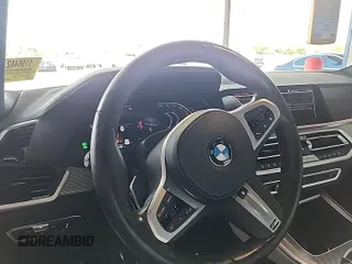 2023 BMW X5 xDrive40i with VIN 5UXCR6C00P9R65110, listed as a IAAI auction lot 42635441 with 32,227 mi miles and . Bid and sale history available at DreamBid. Image 7.