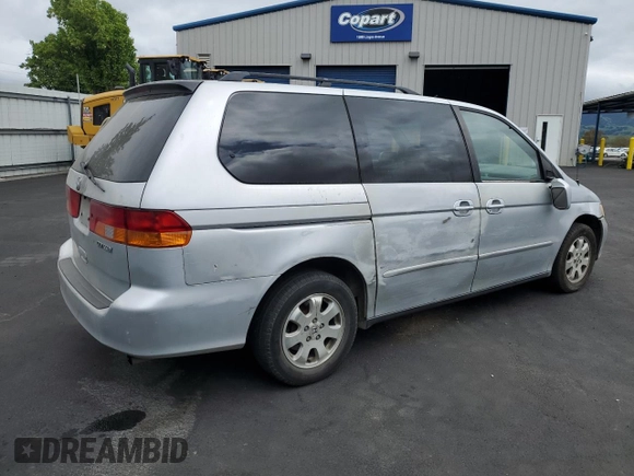 2002 Honda Odyssey EX-L with VIN 2HKRL18902H506828, listed as a Copart auction lot 53735625 with 214,446 mi miles and Salvage title. Bid and sale history available at DreamBid. Image 3.