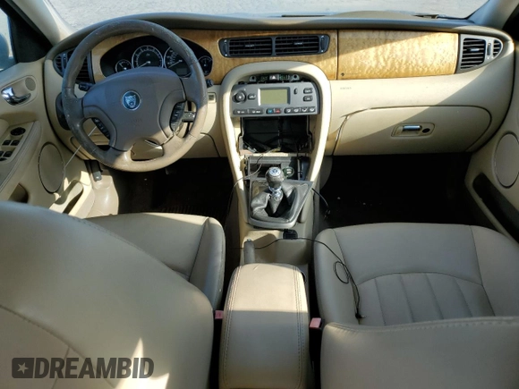 2004 Jaguar X-Type z VIN SAJEB52D94XD67350, wystawiony jako Copart lot #80131904 z przebiegiem 116 329 mil mil oraz Czysty tytuł • Clean title. Historia ofert i sprzedaży dostępna na DreamBid. Obrazek 8.