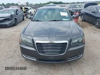 2014 Chrysler 300 S with VIN 2C3CCAGG5EH201509, listed as a IAAI auction lot 42292680 with 162,674 mi miles and . Bid and sale history available at DreamBid. Image 12.