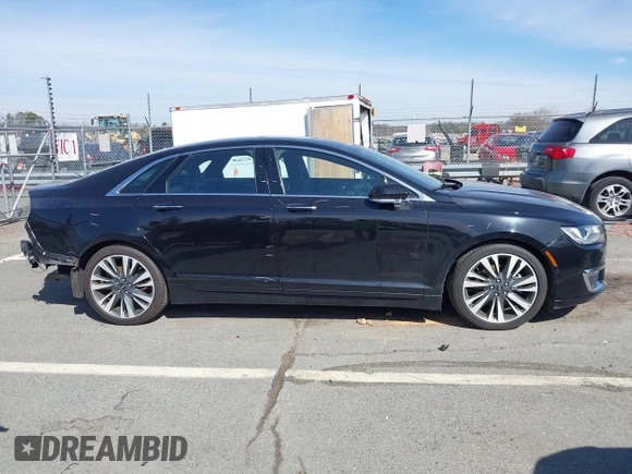 2019 Lincoln MKZ Reserve II z VIN 3LN6L5E94KR610634, wystawiony jako IAAI lot #41599828 z przebiegiem 73 529 mil mil oraz . Historia ofert i sprzedaży dostępna na DreamBid. Obrazek 14.