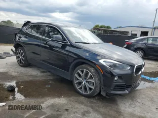 2020 BMW X2 sDrive28i with VIN WBXYH9C05L5R39182, listed as a Copart auction lot 56929605 with 87,253 mi miles and Non repairable. Bid and sale history available at DreamBid. Image 4.