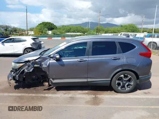2018 Honda CR-V Touring with VIN 7FARW1H90JE030766, listed as a IAAI auction lot 41637900 with Not Provided miles and . Bid and sale history available at DreamBid. Image 14.