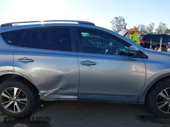 2018 Toyota RAV4 XLE with VIN 2T3WFREV8JW474230, listed as a IAAI auction lot 42687475 with 182,264 mi miles and . Bid and sale history available at DreamBid. Image 13.