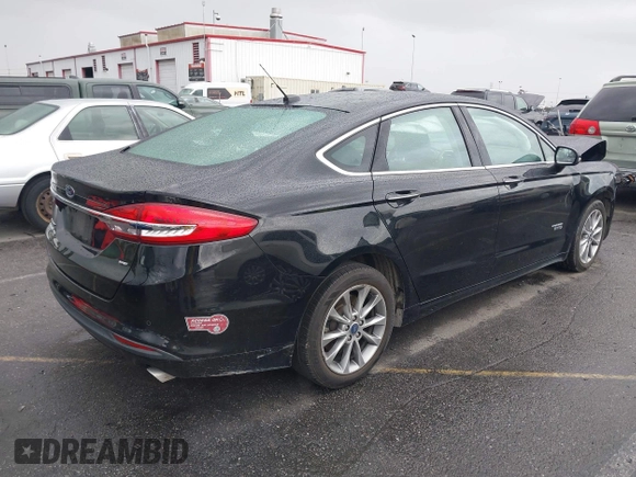 2018 Ford Fusion Energi SE with VIN 3FA6P0PU2JR277481, listed as a IAAI auction lot 41778140 with 51,933 mi miles. Bid and sale history available at carsss.com. Image 4.