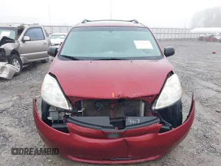 2010 Toyota Sienna CE with VIN 5TDKK4CCXAS318352, listed as a IAAI auction lot 41909416 with 228,041 mi miles. Bid and sale history available at carsss.com. Image 13.