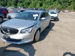 2015 Buick LaCrosse with VIN 1G4GA5G39FF284576, listed as a IAAI auction lot 42622666 with 102,504 mi miles and . Bid and sale history available at DreamBid. Image 2.