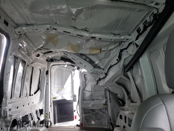 2019 Ford Transit z VIN 1FTYR2CG2KKB82613, wystawiony jako Copart lot #61435345 z przebiegiem 100 090 mil mil oraz Szkoda całkowita • Salvage title. Historia ofert i sprzedaży dostępna na DreamBid. Obrazek 10.