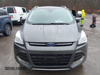2015 Ford Escape Titanium with VIN 1FMCU9JX6FUB79093, listed as a IAAI auction lot 41805057 with 87,788 mi miles. Bid and sale history available at carsss.com. Image 12.