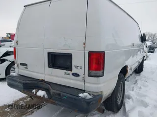 2014 Ford Econoline Cargo Super Duty Commercial with VIN 1FTSE3EL5EDA27709, listed as a IAAI auction lot 41215241 with 214,536 mi miles and . Bid and sale history available at carsss.com. Image 4.