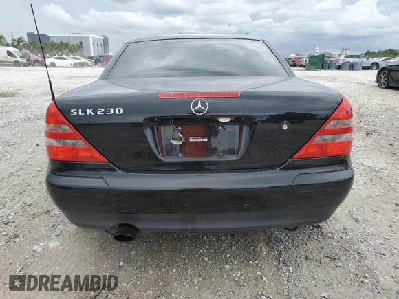 2000 Mercedes-Benz SLK 230 Kompressor with VIN WDBKK47F0YF149827, listed as a Copart auction lot 62524515 with 62,005 mi miles and Salvage title. Bid and sale history available at DreamBid. Image 6.