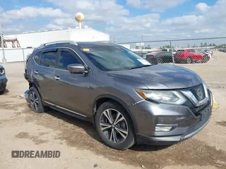 2017 Nissan Rogue SL z VIN 5N1AT2MT0HC881736, wystawiony jako IAAI lot #41506635 z przebiegiem 136 389 mil mil oraz . Historia ofert i sprzedaży dostępna na DreamBid. Obrazek 1.
