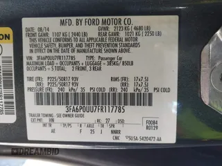 2015 Ford Fusion S Hybrid with VIN 3FA6P0UU7FR117785, listed as a IAAI auction lot 41589546 with 136,657 mi miles. Bid and sale history available at carsss.com. Image 9.