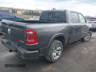 2022 Ram 1500 Laramie with VIN 1C6SRFJT3NN400159, listed as a IAAI auction lot 42167812 with 16,790 mi miles and . Bid and sale history available at DreamBid. Image 4.