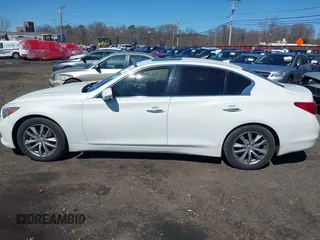 2014 Infiniti Q50 Sport with VIN JN1BV7AP7EM679296, listed as a IAAI auction lot 41834654 with 126,337 mi miles and . Bid and sale history available at DreamBid. Image 14.