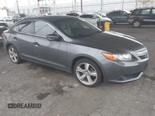 2013 Acura ILX Technology with VIN 19VDE1F74DE015829, listed as a IAAI auction lot 42363136 with 90,398 mi miles and . Bid and sale history available at DreamBid. Image 1.