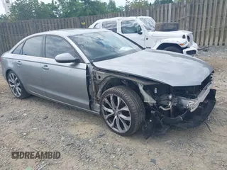 2014 Audi A6 Premium Plus z VIN WAUGFAFCXEN042901, wystawiony jako IAAI lot #42208667 z przebiegiem 131 288 mil mil oraz . Historia ofert i sprzedaży dostępna na DreamBid. Obrazek 1.