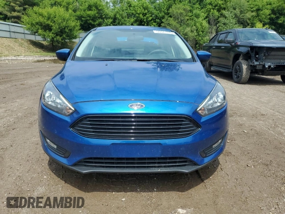 2018 Ford Focus SE with VIN 1FADP3FEXJL282378, listed as a Copart auction lot 59371975 with 30,029 mi miles and Salvage title. Bid and sale history available at DreamBid. Image 5.