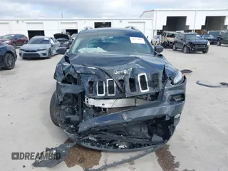 2018 Jeep Cherokee Latitude Plus with VIN 1C4PJMLX8JD603977, listed as a IAAI auction lot 41571092 with 113,554 mi miles and . Bid and sale history available at DreamBid. Image 12.