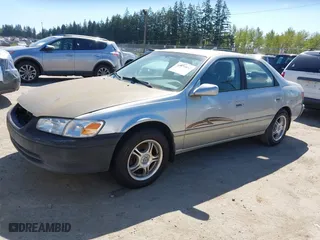 2000 Toyota Camry CE with VIN JT2BG22K6Y0451632, listed as a IAAI auction lot 42030842 with 200,734 mi miles. Bid and sale history available at carsss.com. Image 2.