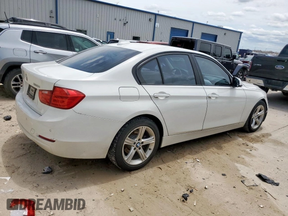 2014 BMW 3 Series 320i z VIN WBA3B1C57EP679989, wystawiony jako Copart lot #56383665 z przebiegiem 125 617 mil mil oraz Szkoda całkowita • Salvage title. Historia ofert i sprzedaży dostępna na DreamBid. Obrazek 3.