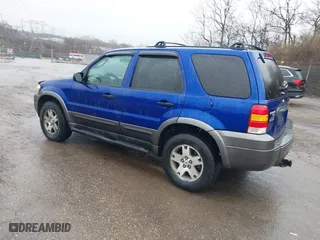 2005 Ford Escape XLT with VIN 1FMYU931X5KA28279, listed as a IAAI auction lot 41861060 with 173,999 mi miles. Bid and sale history available at carsss.com. Image 3.