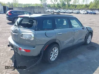 2016 MINI Clubman z VIN WMWLN5C5XG2B35049, wystawiony jako IAAI lot #42219495 z przebiegiem 142 731 mil mil oraz . Historia ofert i sprzedaży dostępna na DreamBid. Obrazek 4.