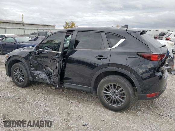 2020 Mazda CX-5 Touring with VIN JM3KFBCM1L0792706, listed as a Copart auction lot 73032144 with 56,845 mi miles and Salvage Title. Bid and sale history available at carsss.com. Image 2.