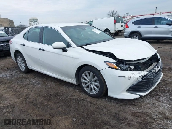 2020 Toyota Camry LE with VIN 4T1C11AK9LU912585, listed as a IAAI auction lot 41711816 with 142,751 mi miles. Bid and sale history available at carsss.com. Image 1.