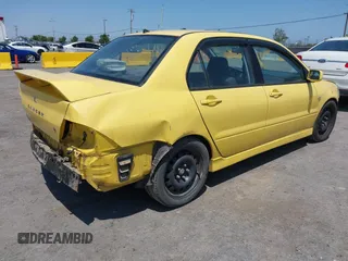 2002 Mitsubishi Lancer OZ-Rally z VIN JA3AJ86EX2U073129, wystawiony jako IAAI lot #42337379 z przebiegiem 257 556 mil mil oraz . Historia ofert i sprzedaży dostępna na DreamBid. Obrazek 4.