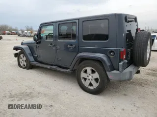 2007 Jeep Wrangler Unlimited Sahara z VIN 1J4GB59147L165439, wystawiony jako Copart lot #50794065 z przebiegiem 255 385 mil mil oraz Szkoda całkowita • Salvage title. Historia ofert i sprzedaży dostępna na DreamBid. Obrazek 2.