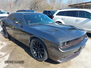 2013 Dodge Challenger R/T with VIN 2C3CDYBT4DH560133, listed as a IAAI auction lot 41660134 with 221,827 mi miles. Bid and sale history available at carsss.com. Image 1.