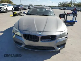 2011 BMW Z4 sDrive35i with VIN WBALM7C59BE384283, listed as a Copart auction lot 77204914 with 87,016 mi miles and Salvage Title. Bid and sale history available at carsss.com. Image 5.
