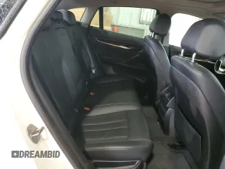 2015 BMW X6 sDrive35i with VIN 5UXKU0C50F0F91865, listed as a Copart auction lot 82128374 with 122,395 mi miles and Salvage Title. Bid and sale history available at carsss.com. Image 10.
