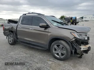 2022 Honda Ridgeline RTL-E with VIN 5FPYK3F76NB028596, listed as a Copart auction lot 54355175 with 42,020 mi miles and Salvage title. Bid and sale history available at DreamBid. Image 4.