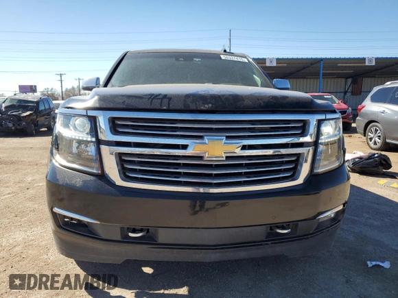 2015 Chevrolet Suburban LTZ with VIN 1GNSKKKC2FR634654, listed as a Copart auction lot 50337415 with 150,255 mi miles and Salvage Title. Bid and sale history available at DreamBid. Image 5.