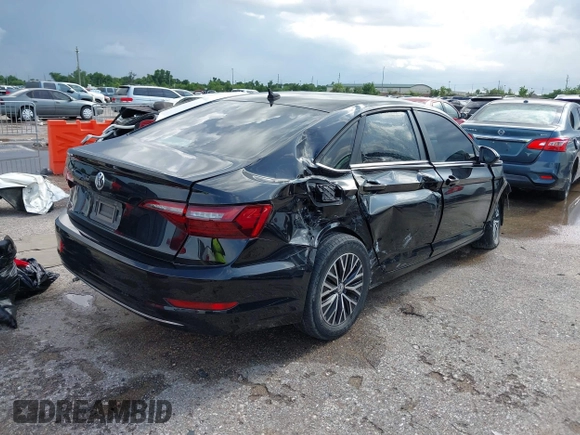 2021 Volkswagen Jetta S with VIN 3VWC57BU3MM060961, listed as a IAAI auction lot 42536668 with 88,576 mi miles and . Bid and sale history available at DreamBid. Image 4.