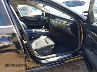2012 BMW 7 Series 750i with VIN WBAKA8C50CCY37892, listed as a IAAI auction lot 42080313 with 148,058 mi miles. Bid and sale history available at carsss.com. Image 5.