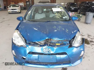 2012 Toyota Prius One with VIN JTDKDTB32C1023106, listed as a IAAI auction lot 42185223 with 210,691 mi miles. Bid and sale history available at carsss.com. Image 6.