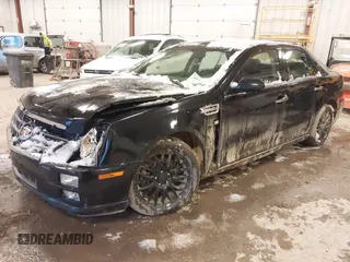 2010 Cadillac STS AWD with VIN 1G6DU6EV2A0125065, listed as a IAAI auction lot 41229886 with 84,954 mi miles and . Bid and sale history available at DreamBid. Image 19.