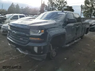 2018 Chevrolet Silverado 1500 LT with VIN 3GCUKREC2JG214570, listed as a Copart auction lot 43422015 with 145,465 mi miles and Salvage Title. Bid and sale history available at carsss.com. Image 1.