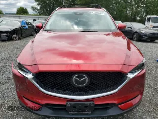 2019 Mazda CX-5 Grand Touring with VIN JM3KFBDM2K0639247, listed as a Copart auction lot 64060045 with 69,563 mi miles and Salvage title. Bid and sale history available at DreamBid. Image 5.