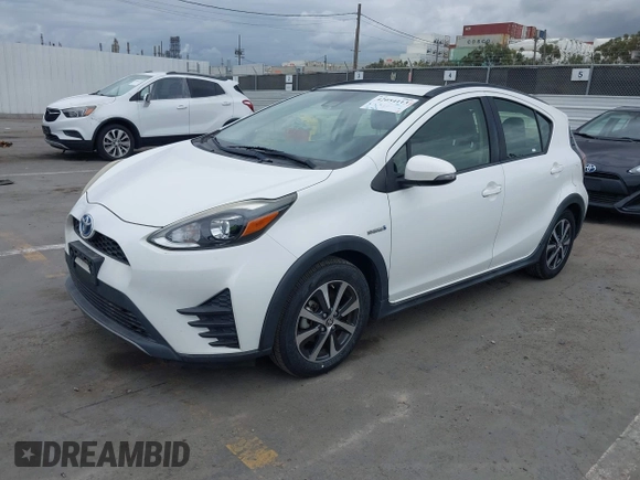 2018 Toyota Prius One with VIN JTDKDTB37J1615520, listed as a IAAI auction lot 42054113 with 76,989 mi miles and . Bid and sale history available at DreamBid. Image 2.