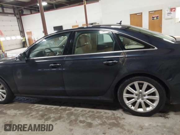 2016 Audi A6 2.0T Premium Plus with VIN WAUGFAFC4GN052293, listed as a IAAI auction lot 41683195 with 85,312 mi miles. Bid and sale history available at carsss.com. Image 15.